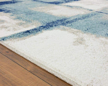 Abstract Ivory Blue Area Rug