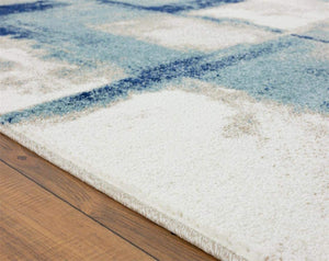 Abstract Ivory Blue Area Rug