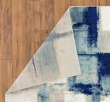 Abstract Ivory Blue Area Rug