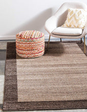 Contemporary Bordered Soft Light Brown Area Rug