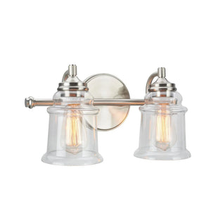 Aspen Creative Two-Light Metal Bathroom Vanity Wall Light Fixture, 15 1/4" Wide, Brushed Nickel with Clear Glass Shade